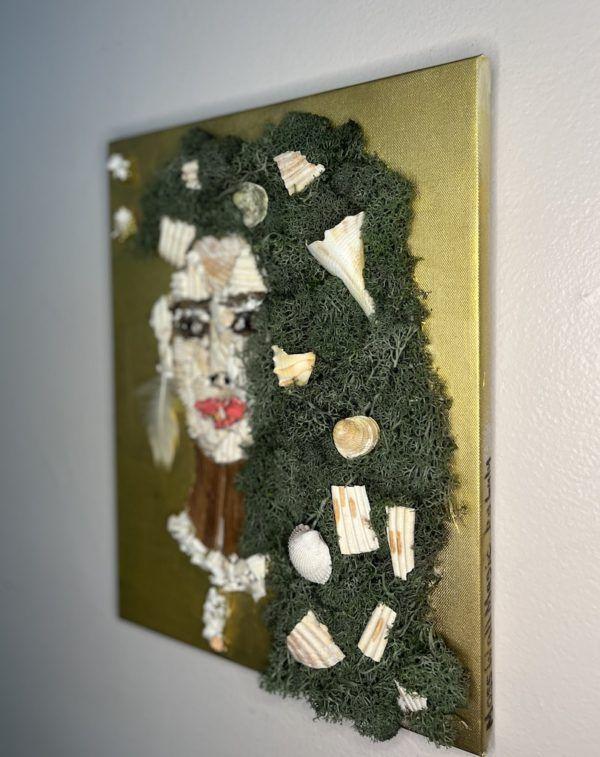 moss wall art - a woman made out of seashells
